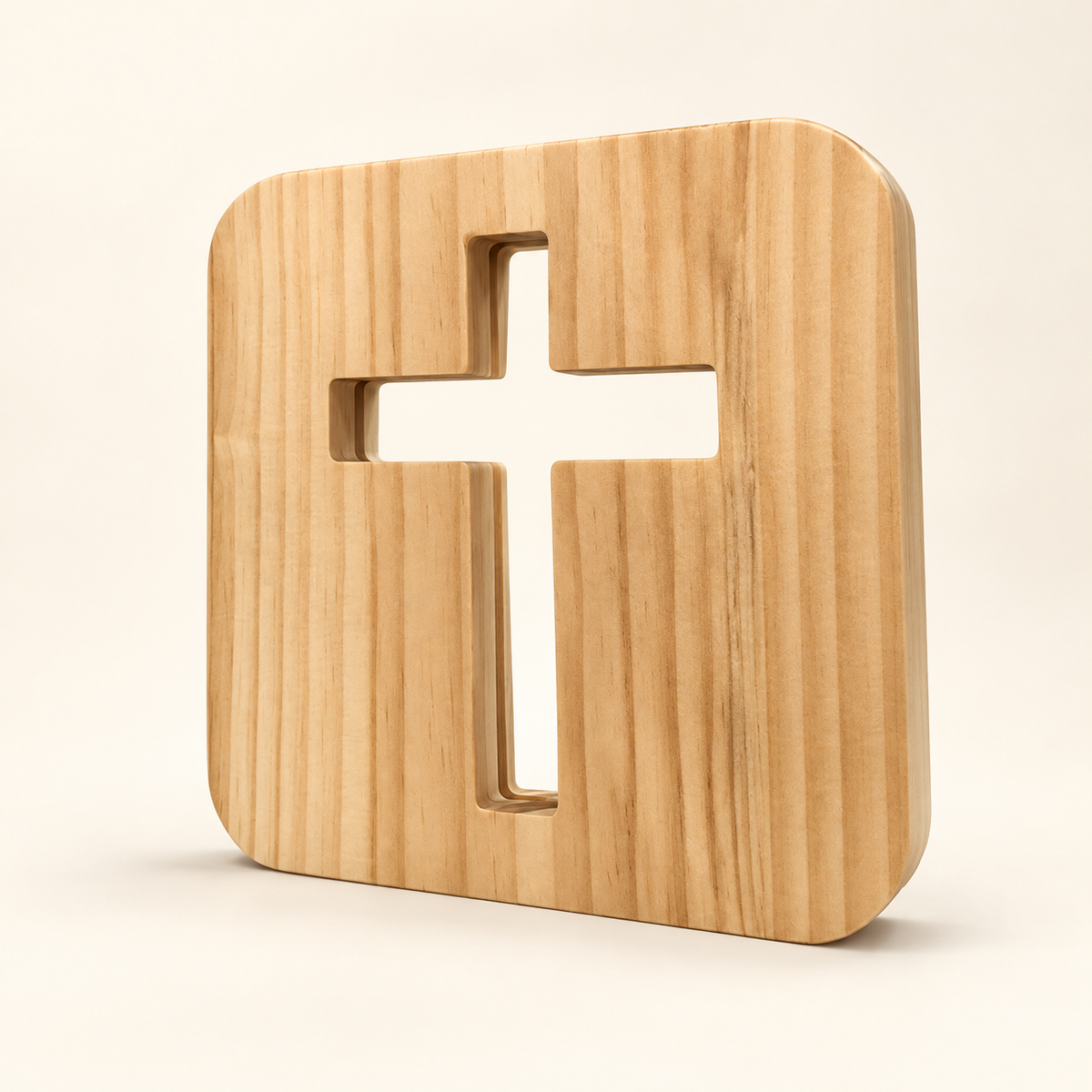 Wooden cross night light on a warm ivory background